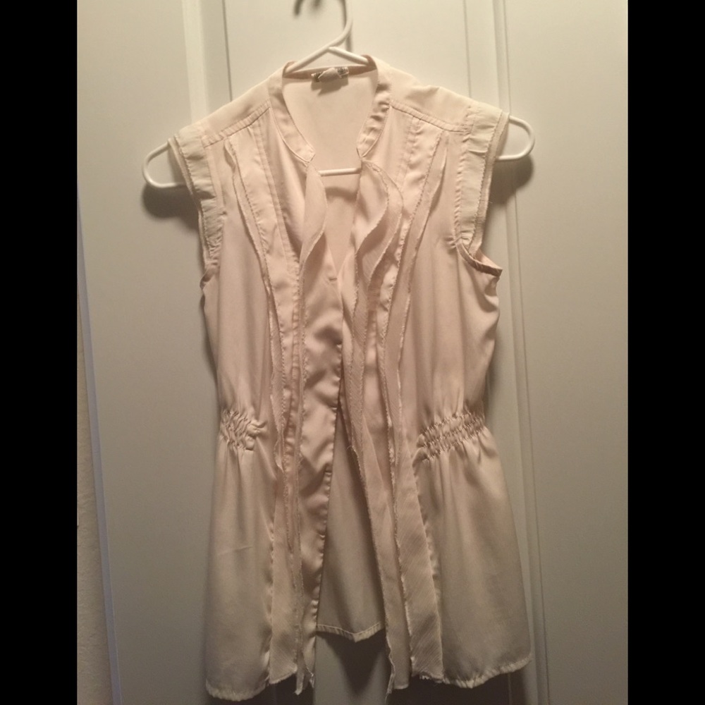 Ruffled front blouse.